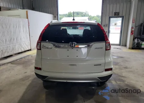 2016 Honda Cr-V Touring z USA, uszkodzony, nr VIN 5J6RM4H94GL106444